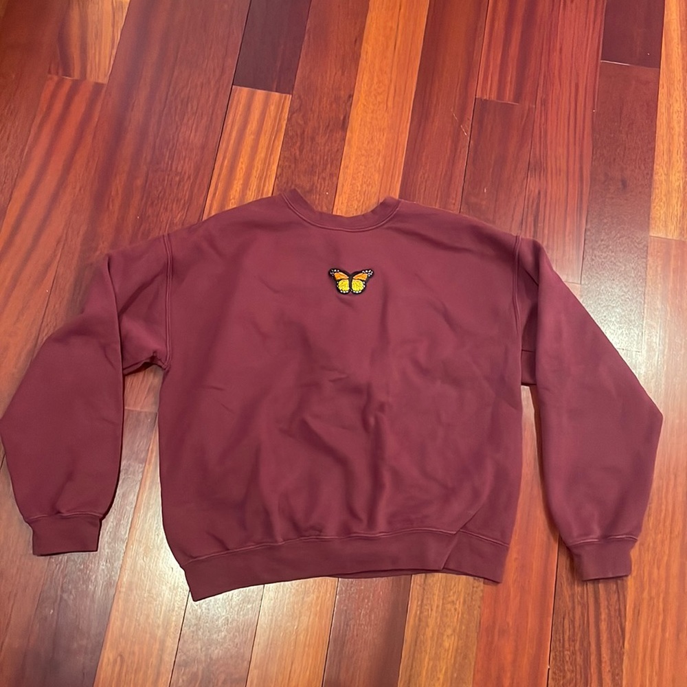 Soft Maroon crewneck with orange butterfly